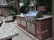 Built in Grill with Brick Base and Granite Countertops